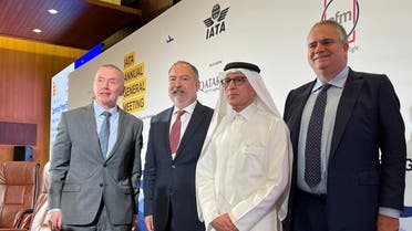 Wille Walsh, Akbar Al Baker, Robin Hayes, and Mehmet Tevfik Nane pose for a photograph after the opening press briefing at 78th global airline industry body IATA’s annual meeting in Doha, Qatar, on June 20, 2022. (Reuters)