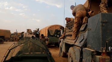 French soldiers from Operation Barkhane, set up a temporary advanced operating base as they leave Gossi, Mali, April 17, 2022. (Reuters)