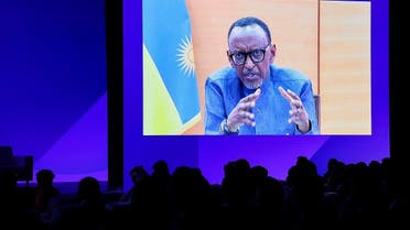 A handout picture released by the Qatar News Agency (QNA) shows Rwanda’s President Paul Kagame speaking, via video link, during a session of the Qatar Economic Forum in Doha on June 21, 2022. (AFP/Qatar News Agency)