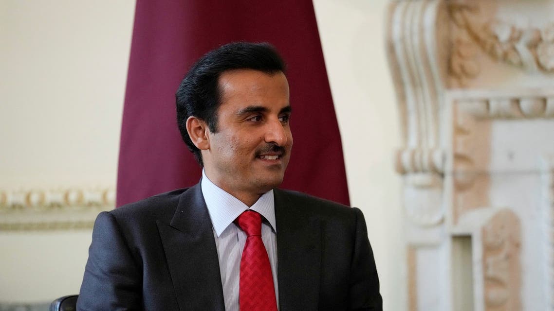 Qatar's Emir Sheikh Tamim bin Hamad al Thani speaks to British Prime Minister Boris Johnson (not pictured) at the start of their meeting at 10 Downing Street, in London, Britain May 24, 2022. (Reuters)