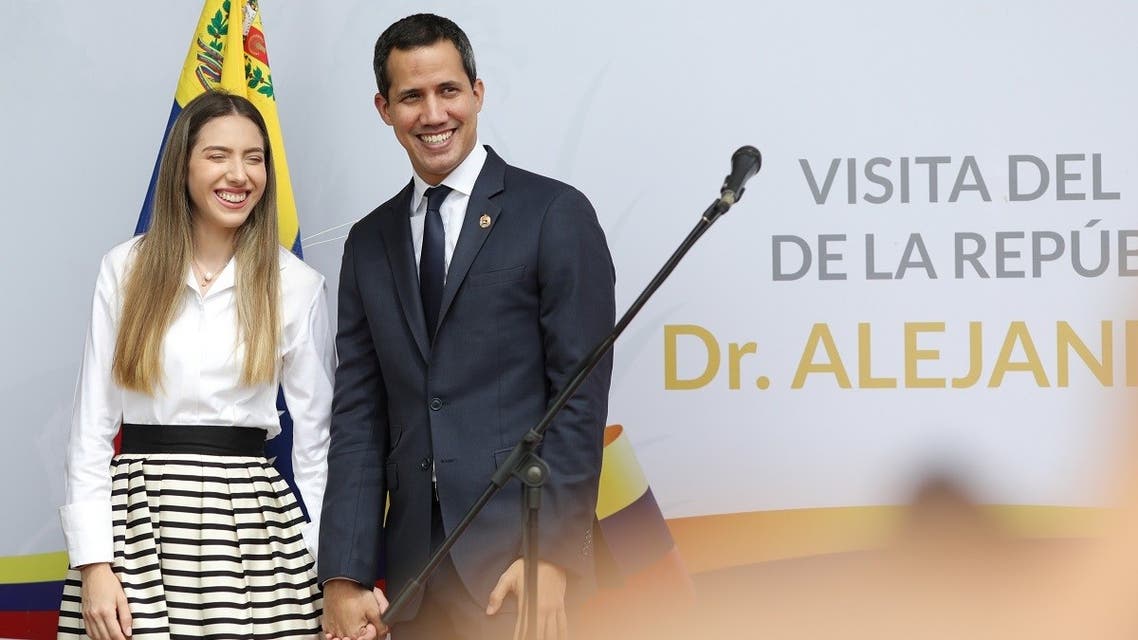 Venezuelan opposition leader Juan Guaido speaks alongside his wife, in Caracas, Venezuela Oct. 12, 2019. (Reuters)