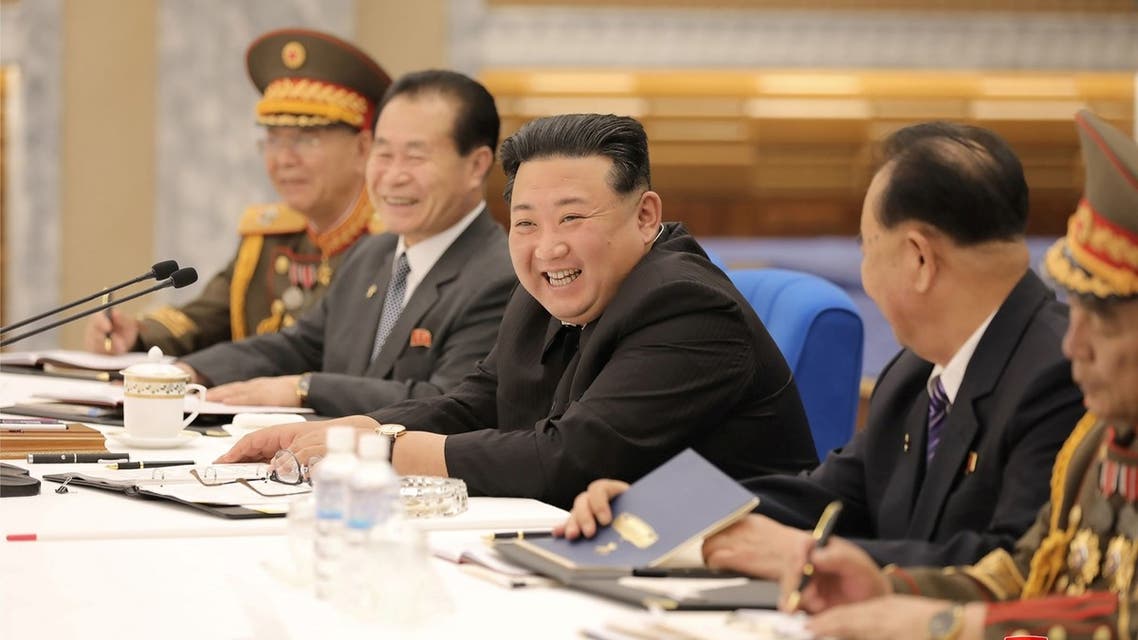 This picture taken on June 22, 2022 and released from North Korea's official Korean Central News Agency (KCNA) on June 23 shows North Korean leader Kim Jong Un (C) attending the second-day of the Third Enlarged Meeting of the Eighth Central Military Commission of the Workers' Party of Korea (WPK) at the party's central committee headquarters building in Pyongyang. (AFP)