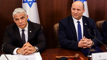 Israeli Prime Minister Naftali Bennett and Israeli Foreign Minister Yair Lapid attend a cabinet meeting at the Prime Minister’s office in Jerusalem on June 26, 2022. ( Reuters)