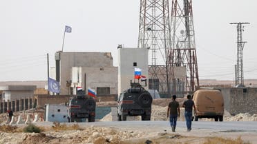  Russian and Syrian national flags flutter on military vehicles near Manbij, Syria October 15, 2019. (File photo: Reuters)