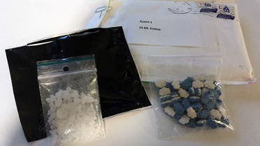 Crystal Meth (L) and Ecstasy drugs seized by a joint Austrian and German police in Vienna, Austria. (File Photo: Reuters)