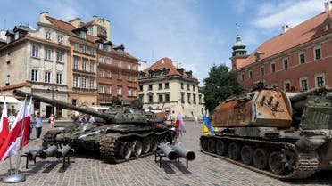 A destroyed Russian T-72B tank and self-propelled howitzer captured by Ukrainian army are presented during an exhibition called For our freedom and yours in the old town of Warsaw, Poland June 27, 2022. (Reuters)