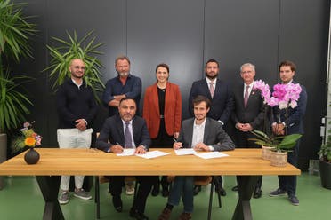 The MoU being signed by Hussain Al Mahmoudi, CEO of SRTI Park, and Lex Hoefsloot, CEO of Lightyear, on June 13 in the Netherlands. (Supplied)