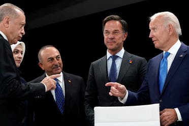 President Joe Biden speaks with Turkish President Recep Tayyip Erdogan during a meeting at the NATO summit in Madrid, June 29, 2022. (Reuters)