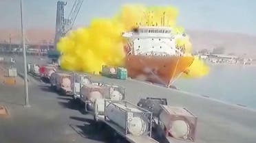 CCTV footage shows a storage tank containing chlorine gas crashing into a ship after falling from a winch, in Aqaba, Jordan June 27, 2022, in this still image taken from a handout video. (Reuters)