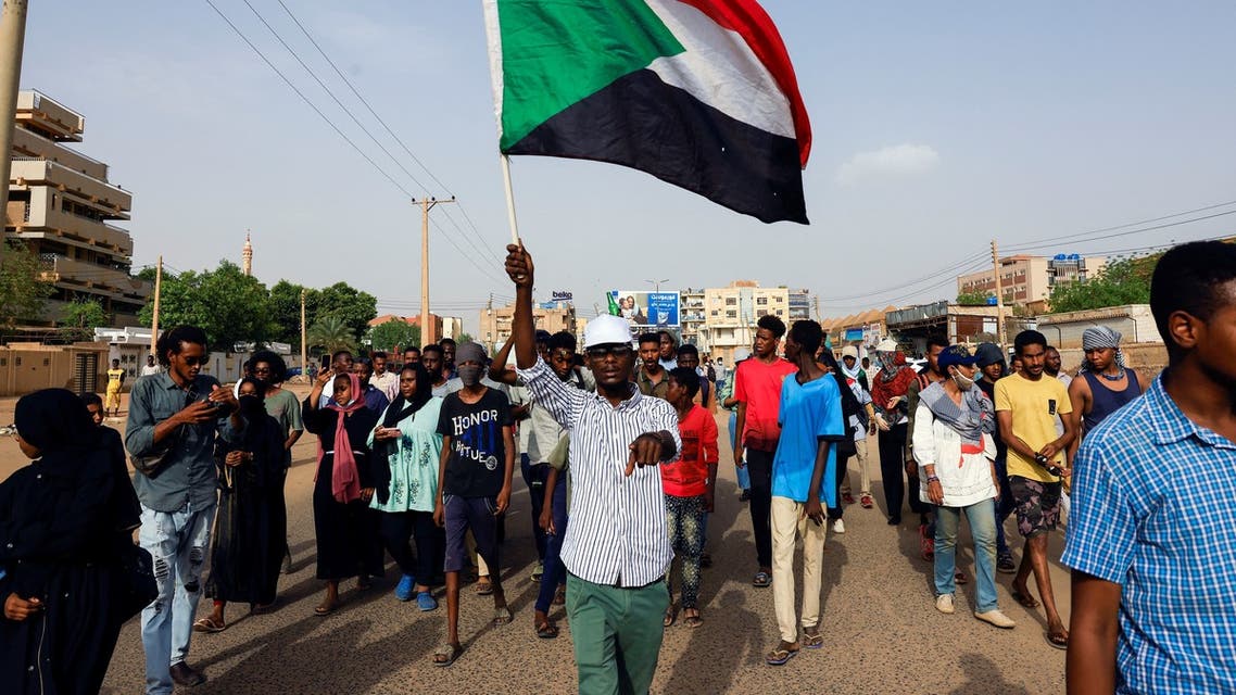 Protesters march during a rally against military rule, following the last coup and to commemorate the 3rd anniversary of demonstrations in Khartoum North, Sudan July 1, 2022. REUTERS/Mohamed Nureldin Abdallah