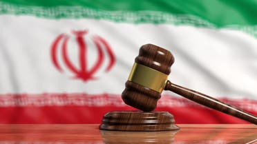 Death penalty in Iran concept. Judge gavel on Iran waving flag background. 3d illustration