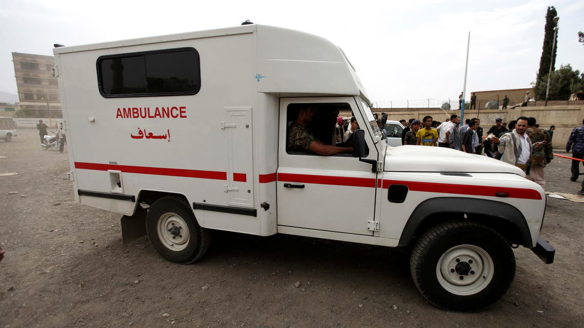 An ambulance is seen at the site of a suicide bombing outside the police academy in Sanaa July 11, 2012. A suicide bomber killed at least 22 people outside the police academy on Wednesday, dramatically exposing the government's vulnerability to al Qaeda-linked insurgents despite a U.S.-backed offensive against them. REUTERS/Mohamed al-Sayaghi (YEMEN - Tags: POLITICS CIVIL UNREST)
