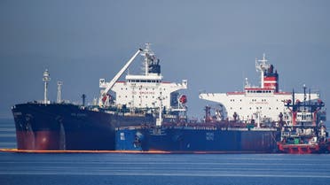 The Liberian-flagged oil tanker Ice Energy transfers crude oil from the Iranian-flagged oil tanker Lana (former Pegas), off the shore of Karystos, on the Island of Evia, Greece, on May 26, 2022. (Reuters)