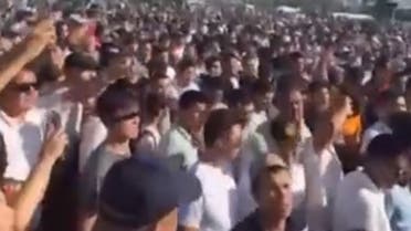 A still photo taken from a video shared shows protesters rally over constitutional reform proposals. (Twitter) 