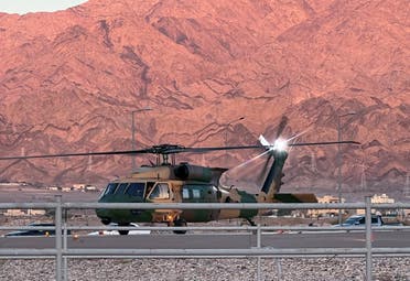 A military helicopter is pictured near a hospital after toxic gas leak from a storage tank in Jordan's Aqaba port, Jordan June 27, 2022. (Reuters)