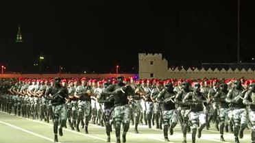 Saudi Arabian security forces marched through a parade ground in Mecca on July 3, 2022 as pilgrims around the world started to converge towards the Muslim holy city for the annual Hajj pilgrimage. (Screengrab / Reuters)