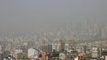 A sandstorm engulfs buildings in the north of Iran's capital Tehran on May 17, 2022. (File photo: AFP)