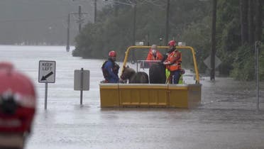  An emergency crew rescues two ponies from a flooded area in Milperra, Sydney metropolitan area, Australia July 3, 2022, in this screen grab obtained from a handout video. (NSW State Emergency Service: Reuters)