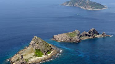 A group of disputed islands, Uotsuri island (top), Minamikojima (bottom) and Kitakojima, known as Senkaku in Japan and Diaoyu in China is seen in the East China Sea, in this photo taken by Kyodo September 2012. (Reuters)