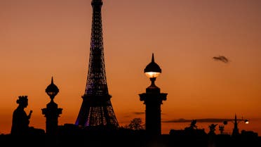 FILE PHOTO: The Eiffel Tower is seen at sunset in Paris amid the coronavirus disease (COVID-19) outbreak in France, January 5, 2022. REUTERS/Gonzalo Fuentes/File Photo