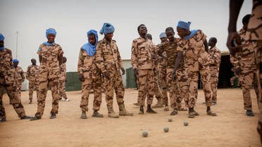 FILE PHOTO: Members of MINUSMA Chadian contingent play petanque in Kidal, Mali December 19, 2016. MINUSMA/Sylvain Liechti handout via REUTERS ATTENTION EDITORS - THIS PICTURE WAS PROVIDED BY A THIRD PARTY./File Photo