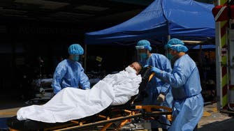 China reports nearly 60,000 COVID-related deaths in a month
