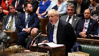UK’s Boris Johnson digs in as top ministers desert government