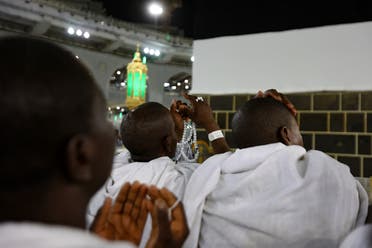 Muslim pilgrims pray around the Kaaba at the Grand Mosque, in Saudi Arabia’s holy city of Mecca on July 6, 2022, during the annual Hajj pilgrimage. (AFP)