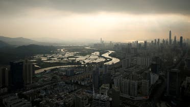 FILE PHOTO: Shenzhen River, the border river that divides Hong Kong (left) and Shenzhen is seen from Shenzhen, China, October 22, 2019. REUTERS/Tyrone Siu/File Photo