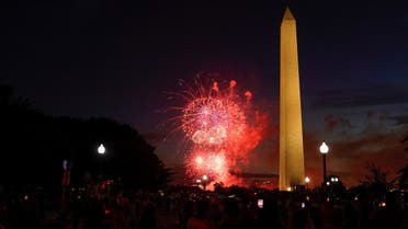 People watch the annual Independence Day fireworks celebration on the National Mall in Washington, July 4, 2022. (Reuters)