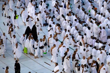 Muslim pilgrims pray around the Kaaba at the Grand Mosque, in Saudi Arabia’s holy city of Mecca on July 6, 2022, during the annual Hajj pilgrimage. (AFP)