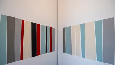 ‘Moonbright,’ (Latex paint; temporary wall painting; 10 meters X 80 cm; 2022) a temporary wall painting, where groupings of vertical stripes mimic the shape of bolts of fabric on display, or books on a shelf, or the vertical stripes of a warped loom. (Courtesy: Warehouse421)
