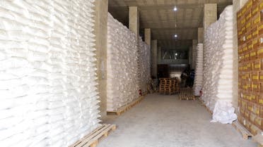 Bags and boxes of humanitarian aid are seen at a storage house near Bab al-Hawa crossing at the Syrian-Turkish border, in Idlib governorate, Syria, June 30, 2021. (Reuters)