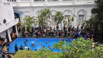 Sri Lanka protesters take dip in swimming pool after storming president’s residence