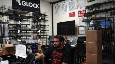 Marketing manager Dimitri Karras, 36, works at a desktop computer inside Firearms Unknown, a gun store in Oceanside, California, U.S., April 12, 2021. (File photo: Reuters)