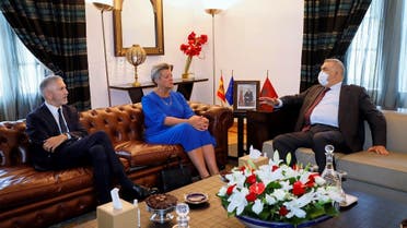 A handout picture released by the Moroccan Interior Ministry shows Interior Minister Abdelouafi Laftit (R) meeting with Ylva Johansson (C), European Commissioner for Home Affairs, and Fernando Grande-Marlaska (L), Spain's Interior Minister, in the capital Rabat on July 8, 2022. (Photo by Moroccan Interior Ministry/AFP)