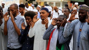Sudanese protesters gather to pray in the capital Khartoum on the Eid al-Adha holiday, during an anti military sit in, on July 9, 2022. (AFP)