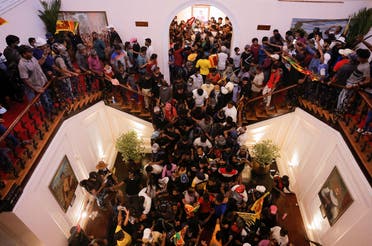 Demonstrators protest inside President Gotabaya Rajapaksa’s residence after he fled amid the country’s economic crisis, in Colombo, Sri Lanka, on July 9, 2022. (Reuters)