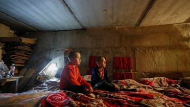 Children sit in a bomb shelter in the course of Ukraine-Russia conflict in the town of Rubizhne in the Luhansk region, Ukraine June 1, 2022. REUTERS/Alexander Ermochenko