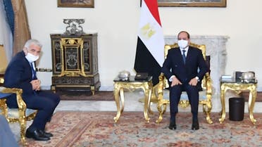 A handout picture released by the Egyptian Presidency shows Egyptian President Abdel Fattah al-Sisi (C) meeting with Israeli Foreign Minister and alternate prime minister Yair Lapid Najib Mikati (C-L) at the presidential palace in the capital Cairo on December 9, 2021. (Photo by Egyptian Presidency / AFP) / === RESTRICTED TO EDITORIAL USE - MANDATORY CREDIT AFP PHOTO / HO / EGYPTIAN PRESIDENCY' - NO MARKETING NO ADVERTISING CAMPAIGNS - DISTRIBUTED AS A SERVICE TO CLIENTS == - === RESTRICTED TO EDITORIAL USE - MANDATORY CREDIT AFP PHOTO / HO / EGYPTIAN PRESIDENCY' - NO MARKETING NO ADVERTISING CAMPAIGNS - DISTRIBUTED AS A SERVICE TO CLIENTS ==