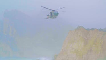 An Oman Royal Air Force helicopter assists the search and rescue team locating the missing expats who were swept away in Mughsail beach. (Twitter)