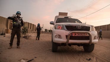 A UN policemen escorts an armored car of the United Nations Stabilization Mission in Mali (MINUSMA), during a patrol in Timbuktu, on December 8, 2021. (AFP)