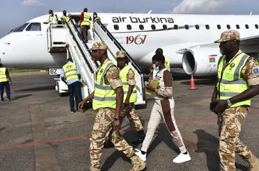 NCB Ouagadougou staff accompany the rescued girl to meet her family upon arrival in Burkina Faso. (Supplied)