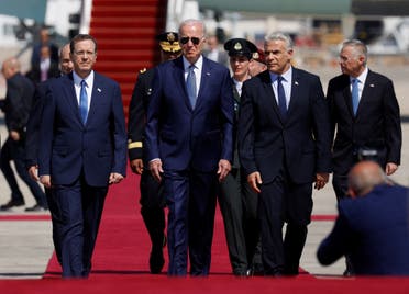 Israeli Prime Minister Yair Lapid and President Isaac Herzog welcomes US President Joe Biden as he lands for a three-day visit, at Ben Gurion International Airport in Lod near Tel Aviv, Israel, July 13, 2022. (Reuters)