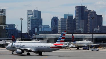 An American Airlines plane taxis in front of the skyline at Logan Airport at the start of the long July 4th holiday weekend in Boston, Massachusetts, U.S., June 30, 2022. (Reuters)