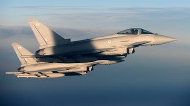 British Royal Air Force's Typhoon Eurofighter jets demonstrate the interception of a Belgian air force transport plane as they fly over Britain, January 14, 2020. (File photo: Reuters)