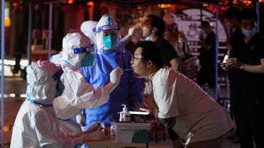 A man gets tested for the coronavirus disease (COVID-19) at a nucleic acid testing site, following the coronavirus disease (COVID-19) outbreak, in Shanghai, China July 12, 2022. (Reuters)
