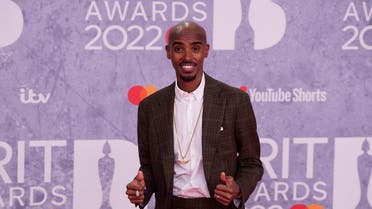 British track athlete Mo Farah poses on the red carpet upon his arrival for the BRIT Awards 2022 in London on February 8, 2022. (AFP)