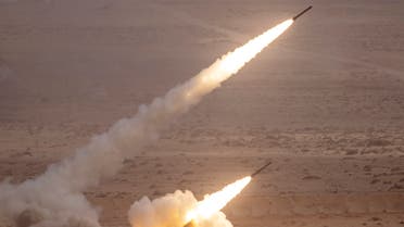 A US M142 High Mobility Artillery Rocket System (HIMARS) fires salvoes during the second annual African Lion military exercise in the Tan-Tan region in southwestern Morocco on June 30, 2022. (Photo by FADEL SENNA / AFP)