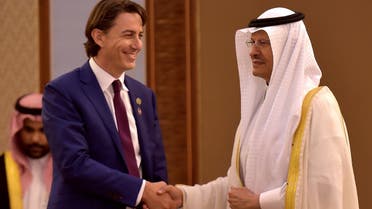 (L to R) Amos Hochstein, the US Senior Advisor for Energy Security, and Saudi Arabia's Energy Minister Prince Abdulaziz bin Salman al-Saud shake hands after signing bilateral agreements during an investment agreement signing ceremony between the US and Saudi Arabia in the Red Sea coastal city of Jeddah on July 15, 2022. (AFP)